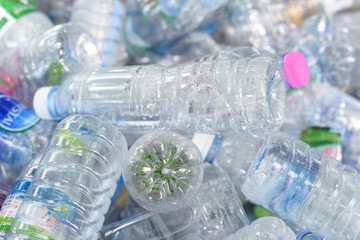 A Pile of PET plastic bottle or used plastic bottles.