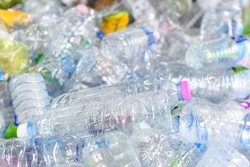 A Pile of PET plastic bottle or used plastic bottles.