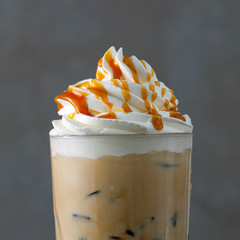 iced coffee latte with whipped cream and caramel sauce