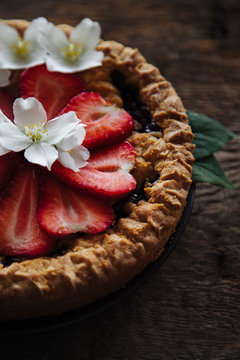 Strawberry tart on a wooden table