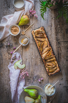 Rustic pears and almond cake in a rustic setting