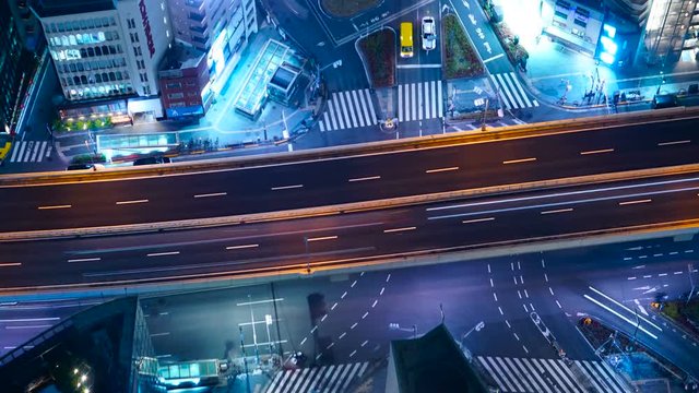 東京交通　タイムラプス　ハイアングルで望む大都会の交差点　夜景
