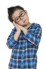 Student boy in glasses feels sleepy on isolated white background with blue shirt