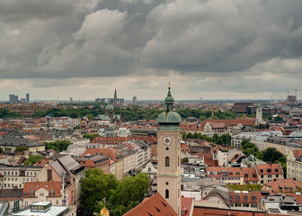 Fototapeta premium General aerial view of Munich from a tower on a partly cloudy day