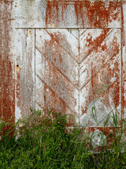 Old door texture and background predominant colors are red and white