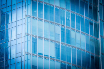 Fototapeta na wymiar Blue glass office building