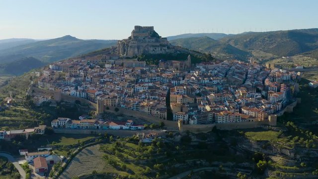 Front view of whole Morella old city surrounded by old stone wall. Morella is an old mediaval town, a Templar territory. Castellon province in Valencia, Spain