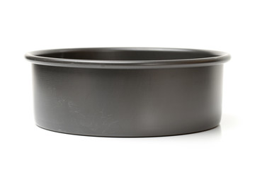 Metal cake mold over on white background 