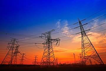 Fototapeta premium Electric tower, silhouette at sunset