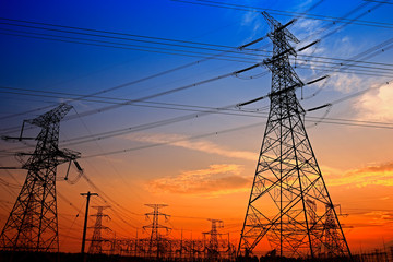 Electric tower, silhouette at sunset