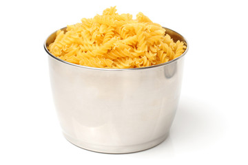 Italian pasta (Gomiti Rigati) on white background 