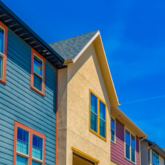 Square Exterior view of houses with balcony and multi colored wall