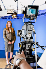 Young lady ready to conduct a program in a studio