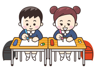 机で勉強する小学生の男女