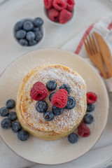 Delicious home made sweet vanilla pancakes with berries