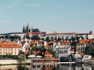 Naklejka na ściany i meble Sunrise and Prague Castle from Charles Bridge in Prague, Czech Republic 