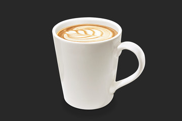 White cup with liquid latte, isolated black background