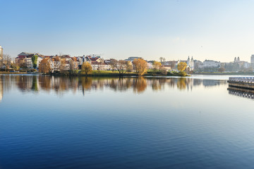 Fototapeta na wymiar View of Upper Town and Traetskae Pradmestse or Trinity Suburb on Svisloch river bank in Minsk. Belarus