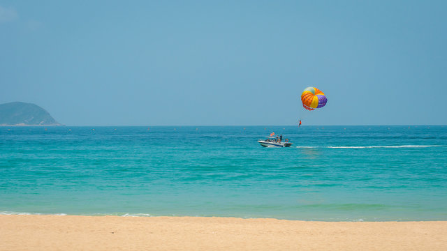 Parasailing, parascending, parakiting - is a this fascinating active form of recreation. where a person is towed by a boat and he flies with a parachute over the water.