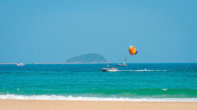 Parasailing, parascending, parakiting - is a this fascinating active form of recreation. where a person is towed by a boat and he flies with a parachute over the water.