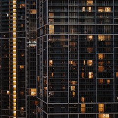 Fototapeta na wymiar Close up view of modern building in city at night
