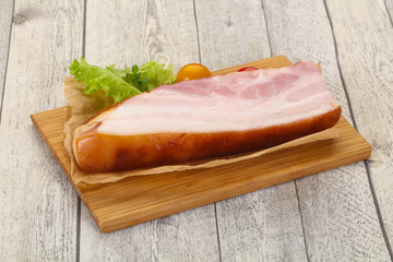 Smoked pork breast with salad leaves