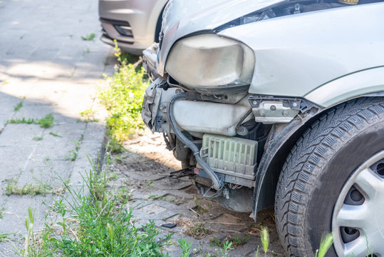 Front side of broken and damaged car in traffic crash accident with fatal outcome in collision