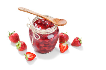 Glass jar of strawberry jam and fresh berries  isolated on white background.