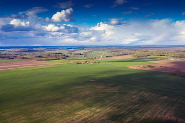 Fototapeta na wymiar Cloudy day in latvian countryside.