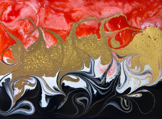 Red and gold marbling pattern. Golden marble liquid texture.