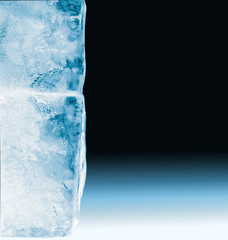 Textured frosty crystal clear ice blocks, isolated on black background with copy space.