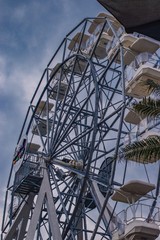 ferris wheel against blue sky