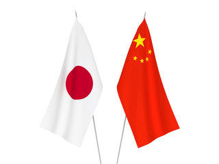 Obraz premium National fabric flags of China and Japan isolated on white background. 3d rendering illustration.