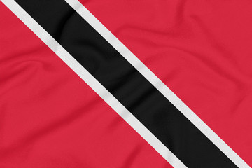 Flag of Trinidad and Tobago on textured fabric. Patriotic symbol