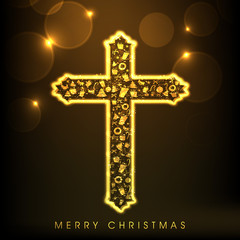 Shiny golden cross for Merry Christmas celebration.