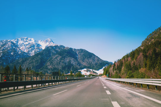 Driving A Car On The Autobahn Between The Mountains In Slovenia