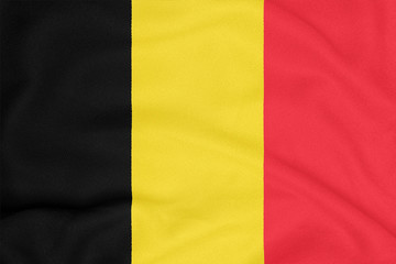 Flag of Belgium on textured fabric. Patriotic symbol