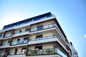 Obraz premium Multistory new modern apartment building. Stylish living block of flats.