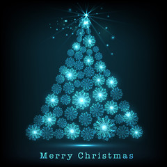 Merry Christmas celebration with snowflake decorated Xmas Tree.