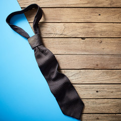 Fathers day tie on wooden desk backround