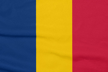 Flag of Chad on textured fabric. Patriotic symbol