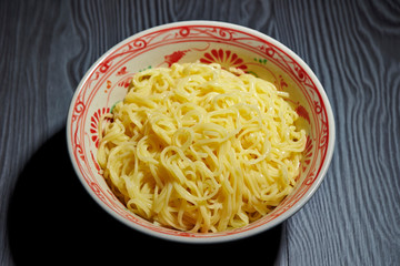 Boiled yellow noodle in bowl 