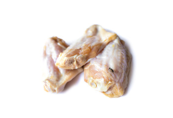 Raw chicken wings isolated on white background