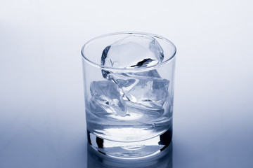 Ice cube melts in studio: Global warming concept