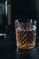 alcoholic drink whiskey in a glass without ice