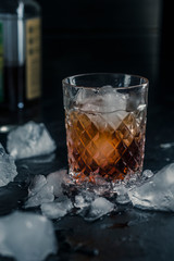alcoholic whiskey drink in an ice glass