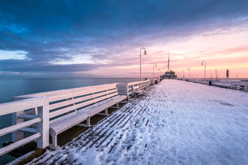 Snow covered pier in Sopot. Winter landscape. Poland.