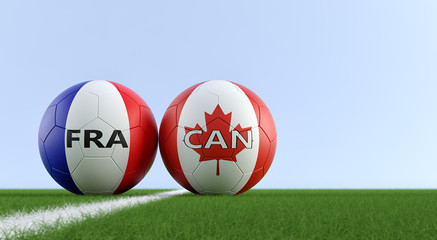 France vs. Canada Soccer Match - Soccer balls in France and Canada national colors on a soccer field. Copy space on the right side - 3D Rendering 