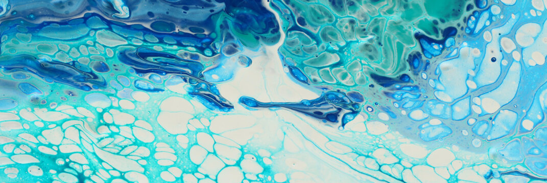 photography of abstract marbleized effect background. Blue, mint and white creative colors. Beautiful paint. banner