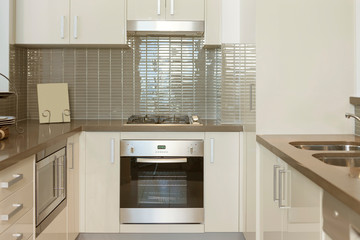 Fototapeta premium Small kitchen with built in stove